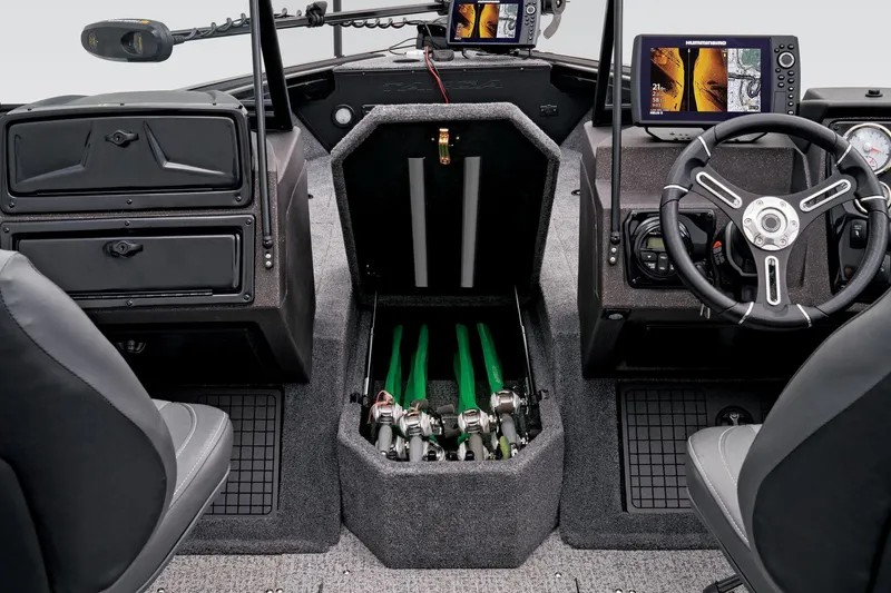 Slide: The Image of 2023 Tracker Targa V-19 WT boat interior with rod storage and navigation equipment. - 28