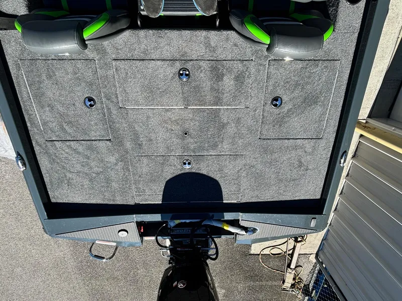 Slide: The Image of 2025 Ranger RT 198P boat interior with storage compartments and seating. - 7