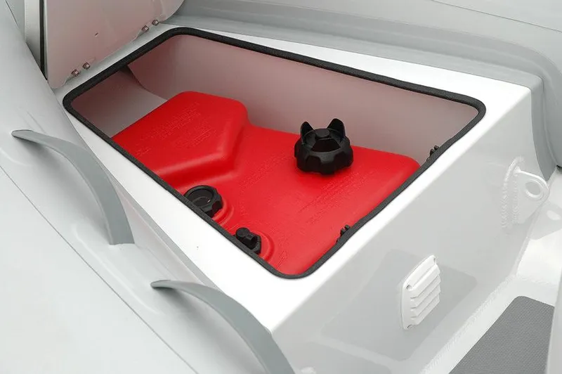 Slide: The Image of Storage compartment of 2023 AB Inflatables 10 AL with red fuel tank. - 3