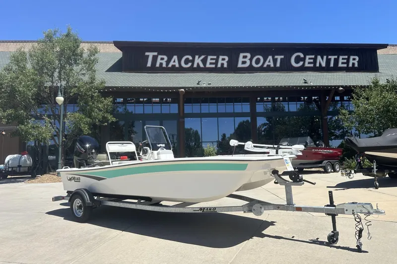 Slide: The Image of 2023 Mako Pro Skiff 17 CC boat on trailer at Tracker Boat Center. - 1