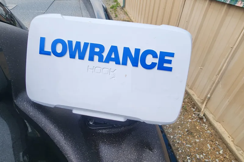 Slide: The Image of Lowrance Hook device on 2023 Tracker Pro Team 190 TX boat. - 12