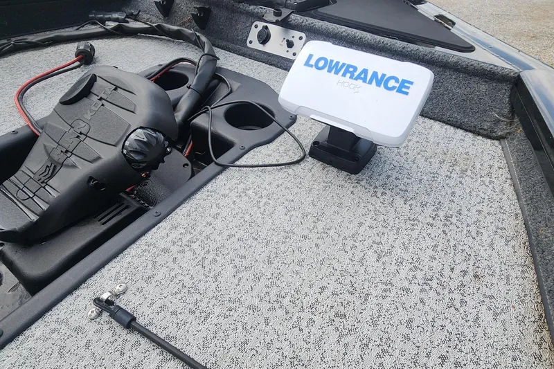 Slide: The Image of 2023 Tracker Pro Team 190 TX boat with Lowrance fish finder on deck. - 17