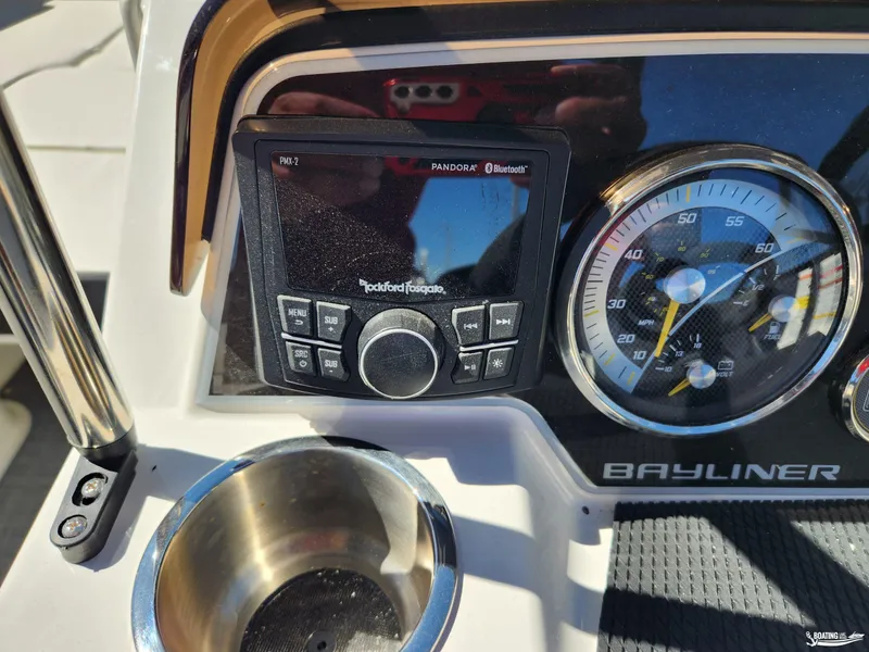Slide: The Image of 2023 Bayliner DX2250 dashboard with Rockford Fosgate audio system and speedometer. - 21