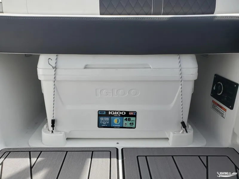 Slide: The Image of Igloo cooler secured on 2023 Monterey M22 boat deck. - 10