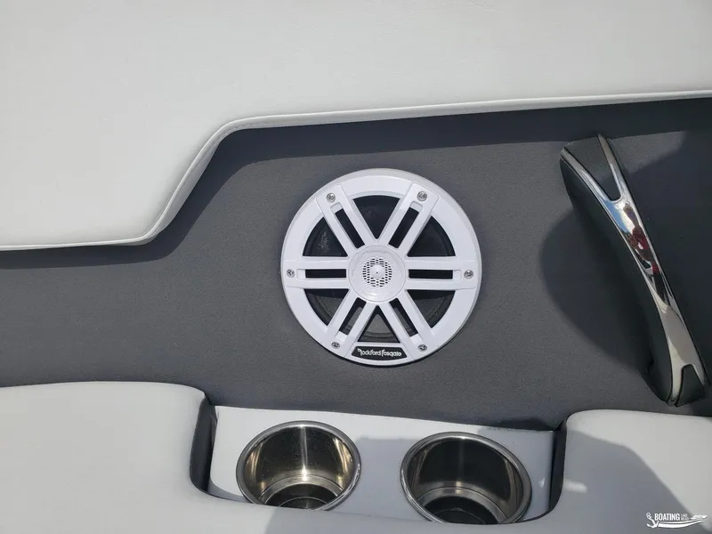 Slide: The Image of 2023 Monterey M22 boat interior with speaker and cup holders. - 11
