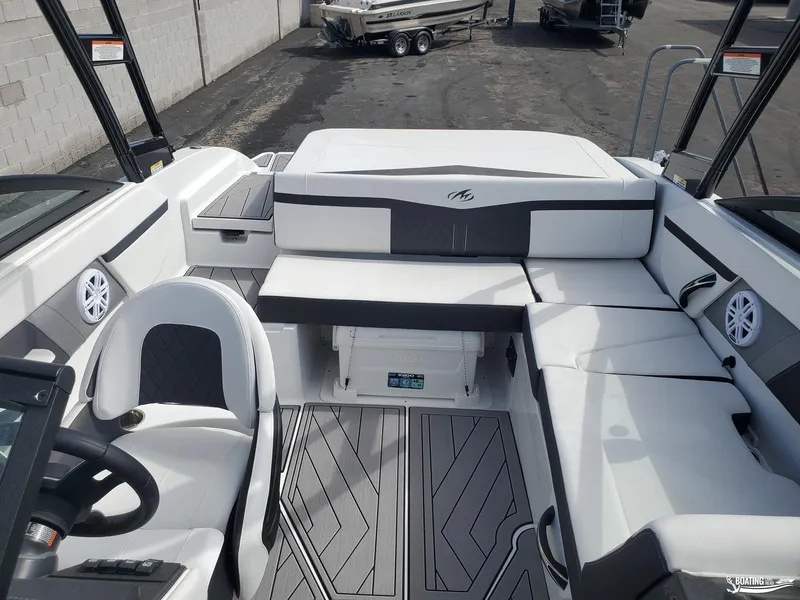 Slide: The Image of 2023 Monterey M22 boat interior with sleek seating and modern design. - 9
