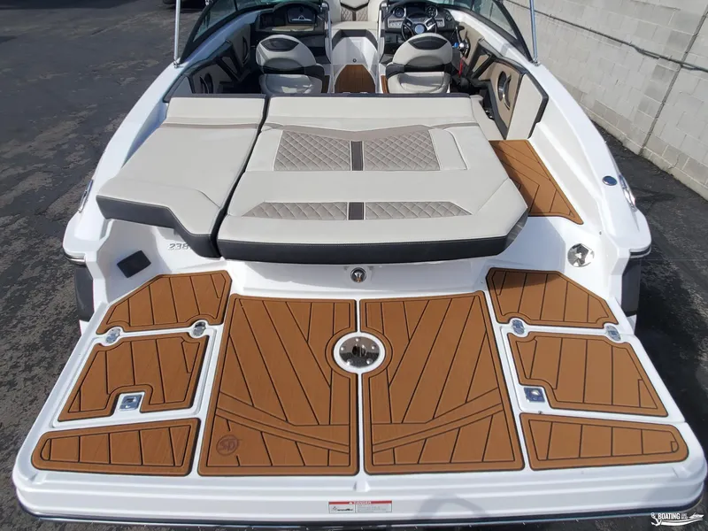 Slide: The Image of 2023 Monterey 238SS boat with spacious seating and stylish deck design. - 21