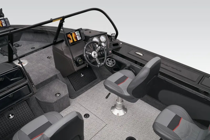 Slide: The Image of 2023 Tracker Targa V-19 WT boat interior with cup holders and storage compartments. - 32