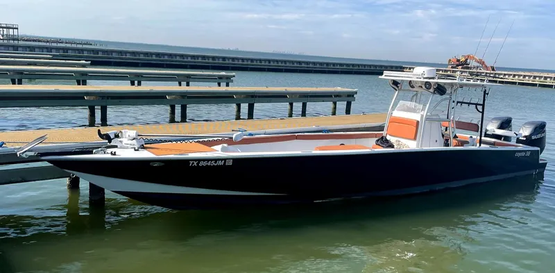 The Image of Custom 1986 38 Coyote boat docked in marina with clear skies. - 0