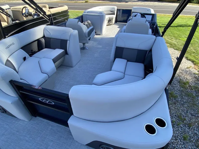 Slide: The Image of 2023 Harris Cruiser 230 CWDH pontoon boat interior with luxurious seating. - 5