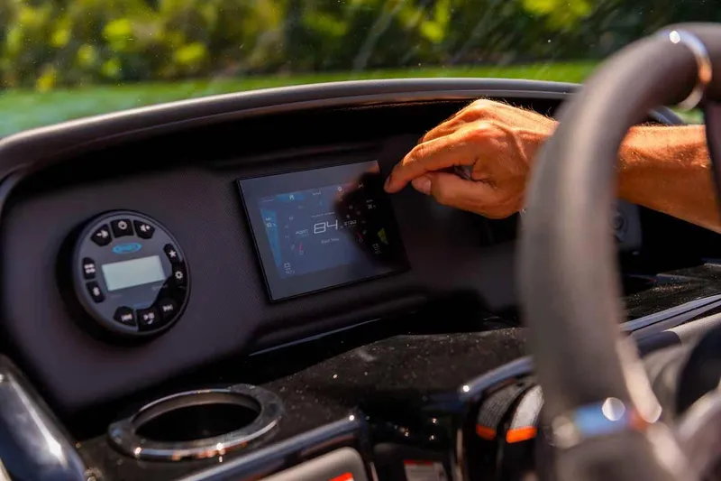 Slide: The Image of Close-up of 2023 Yamaha Boats AR195 dashboard with touchscreen controls. - 12