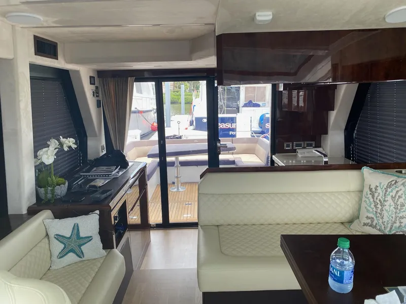 Slide: The Image of Interior of 2022 Galeon 470 Skydeck yacht with elegant seating and decor. - 10