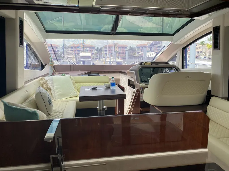 Slide: The Image of Interior of 2022 Galeon 470 Skydeck yacht with luxurious seating and helm. - 12