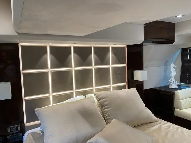 Slide: The Image of Luxurious interior of 2022 Galeon 470 Skydeck yacht bedroom with modern lighting and decor. - 18