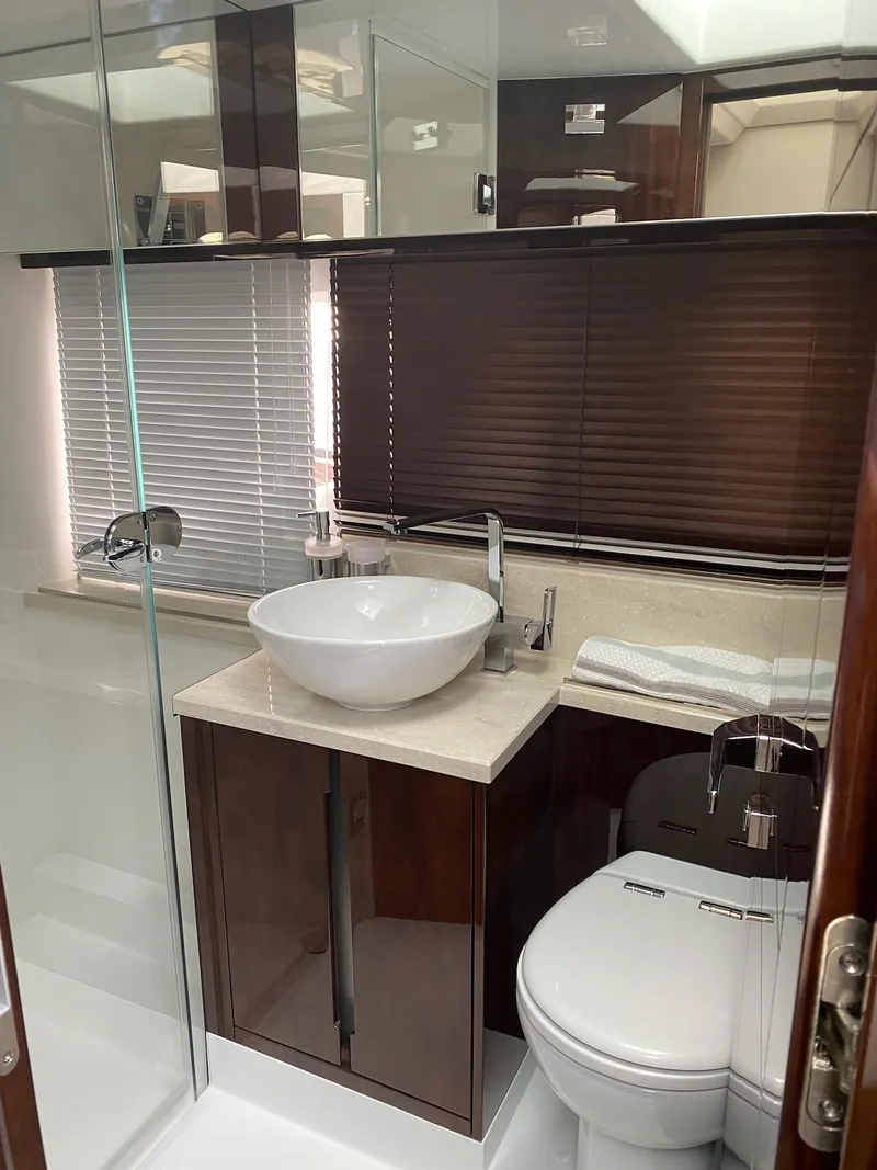 Slide: The Image of Luxurious bathroom in 2022 Galeon 470 Skydeck yacht with modern fixtures and elegant design. - 19