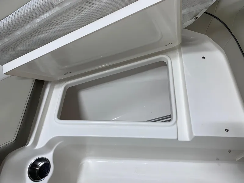 Slide: The Image of 2024 Key West 203 DFS storage compartment with open lid - 13