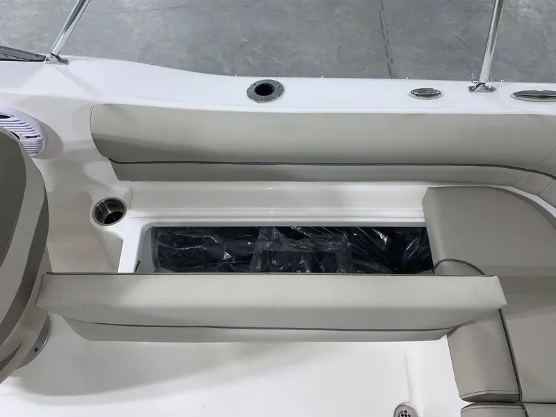 Slide: The Image of 2024 Key West 203 DFS boat interior seating and storage compartment. - 7