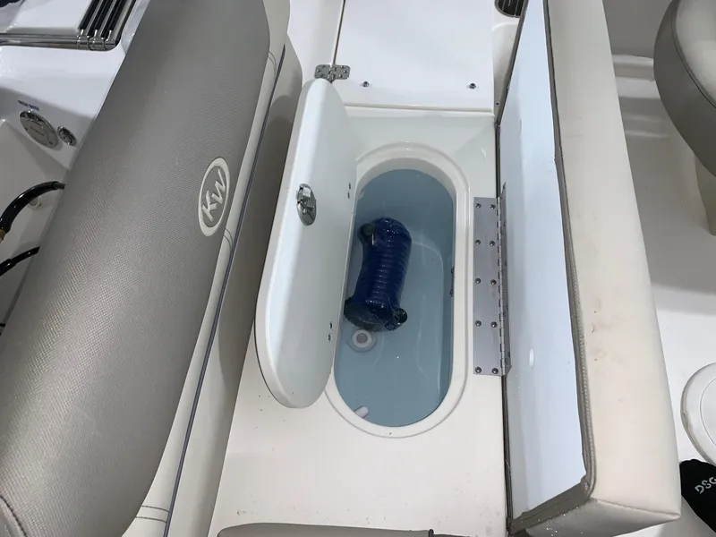 Slide: The Image of 2024 Key West 203 DFS boat with open storage compartment. - 6
