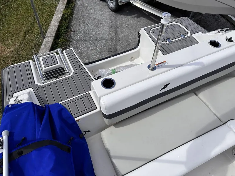 Slide: The Image of 2023 Starcraft SVX 191 boat interior with seating and storage compartments. - 5