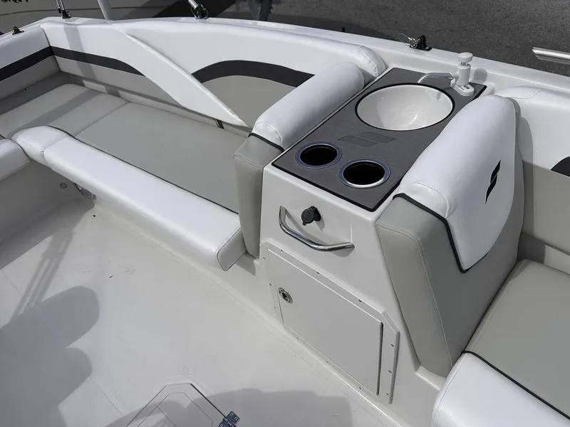 Slide: The Image of 2023 Starcraft SVX 191 boat interior with seating and cup holders. - 8