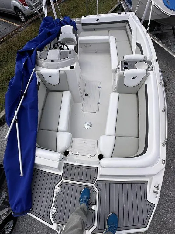 Slide: The Image of 2023 Starcraft SVX 191 boat interior with seating and steering console. - 9