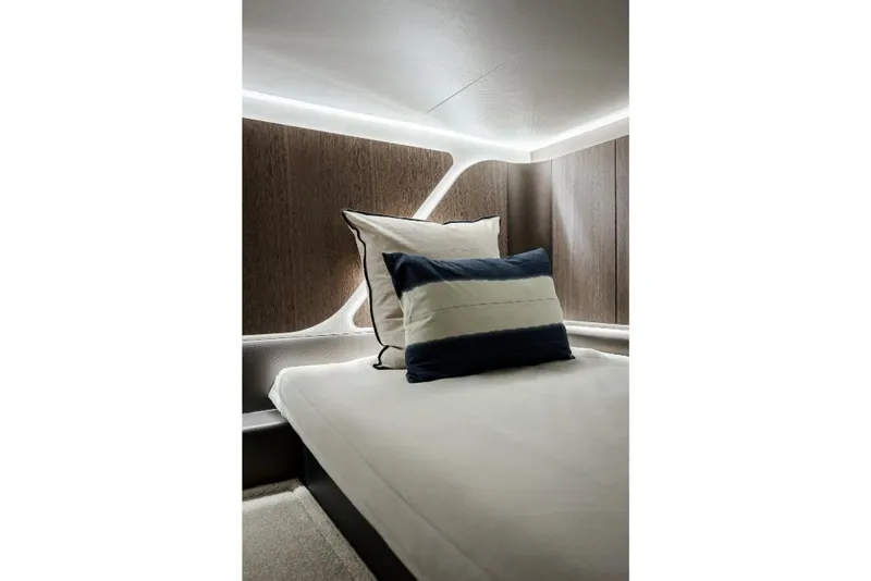 Slide: The Image of Modern cabin interior of 2023 Galeon 375 GTO yacht with stylish bedding. - 25