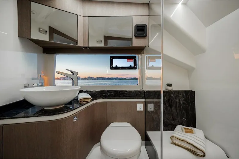 Slide: The Image of Modern bathroom interior on 2023 Galeon 375 GTO yacht with ocean view. - 30
