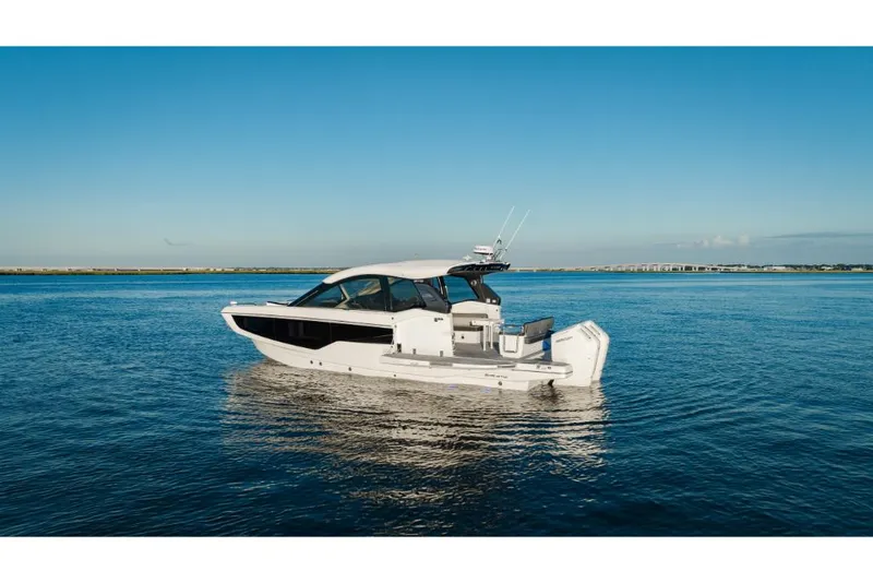 Slide: The Image of 2023 Galeon 375 GTO luxury yacht on calm blue waters. - 34