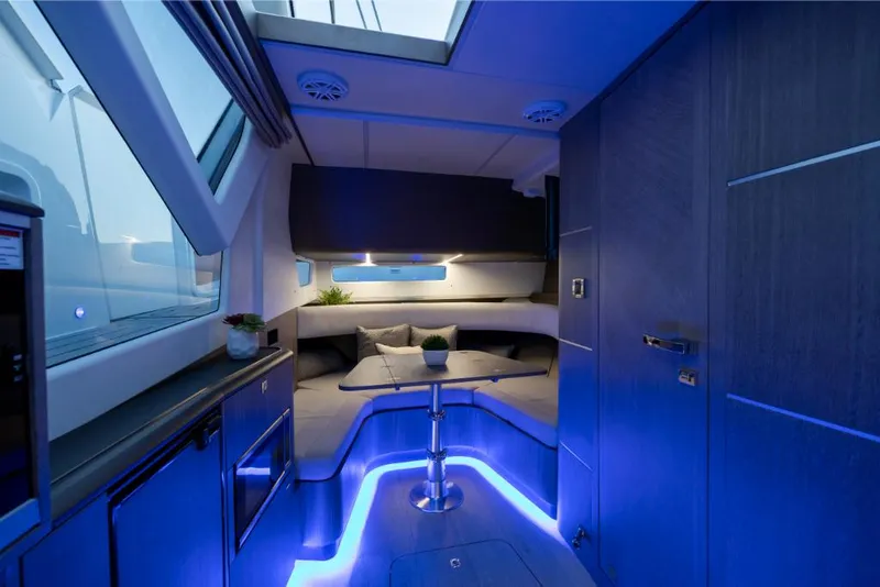 Slide: The Image of 2023 Galeon 375 GTO yacht interior with modern blue LED lighting. - 46