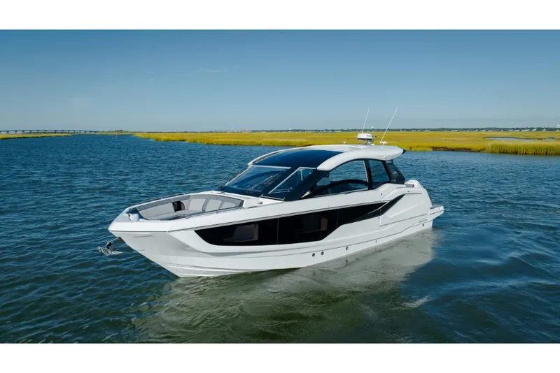 Slide: The Image of 2023 Galeon 375 GTO luxury yacht cruising on calm waters. - 47