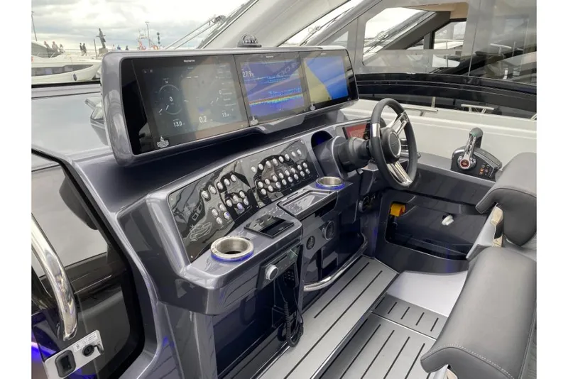 Slide: The Image of 2023 Galeon 375 GTO helm with advanced navigation system and modern controls. - 6