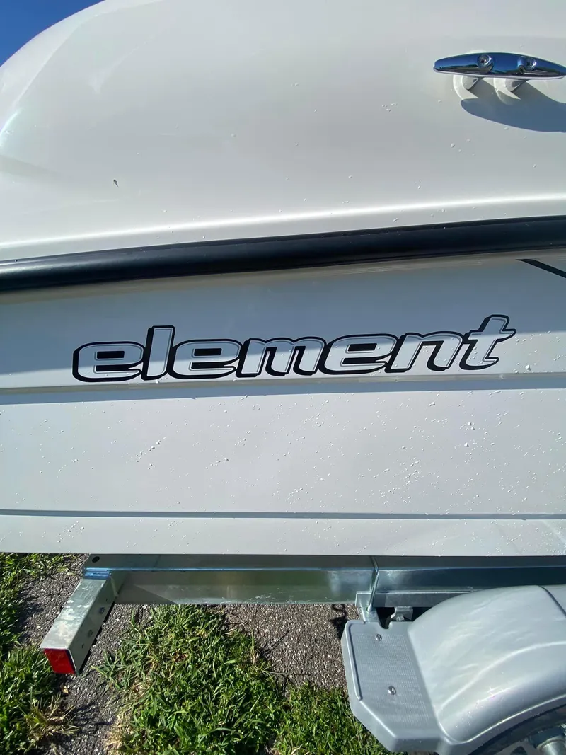 Slide: The Image of 2023 Bayliner E21 Element boat side view. - 8