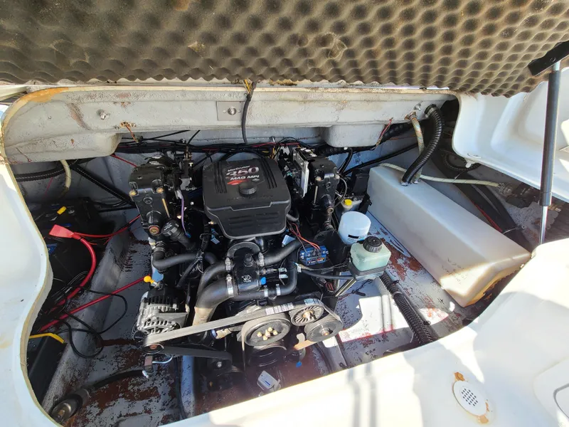Slide: The Image of 2003 Crownline 230BR boat engine compartment with MerCruiser 5.0 MPI engine. - 18