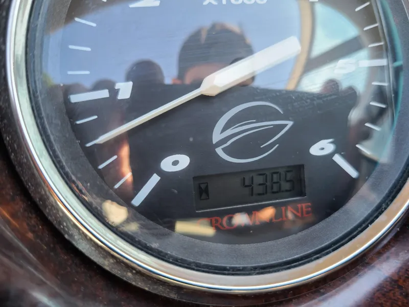 Slide: The Image of Close-up of 2003 Crownline 230BR boat tachometer showing 438.5 hours. - 23
