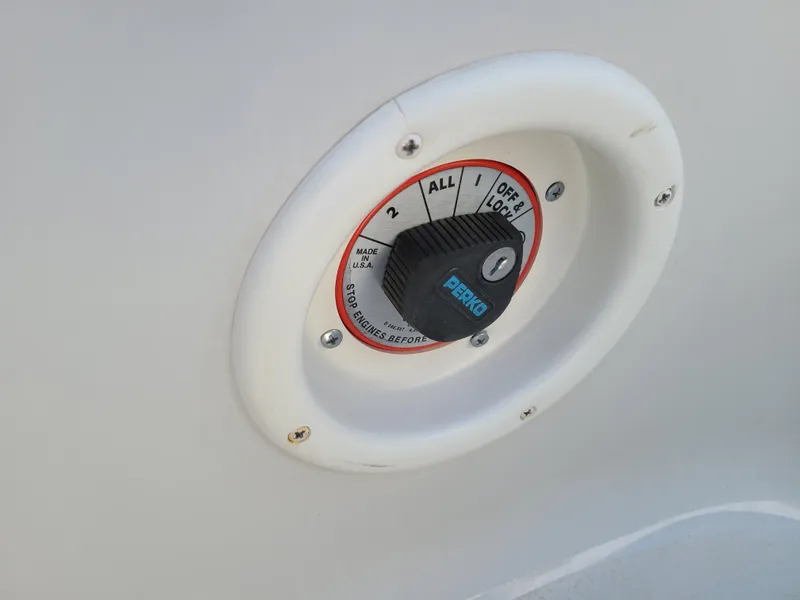Slide: The Image of Battery selector switch on a 2003 Crownline 230BR boat. - 27