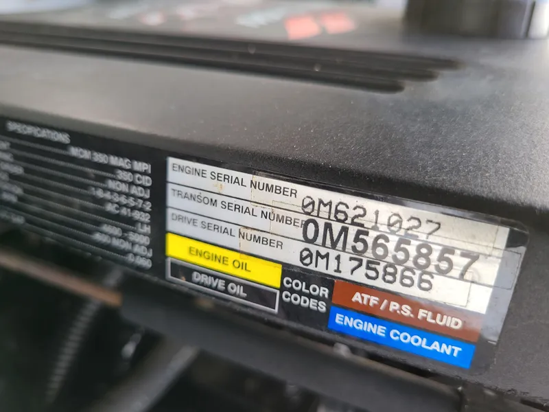 Slide: The Image of Close-up of serial numbers on a 2003 Crownline 230BR engine. - 28