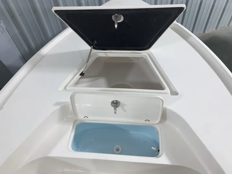 Slide: The Image of 2024 Key West 188 Bay Reef boat storage compartments and livewell. - 5