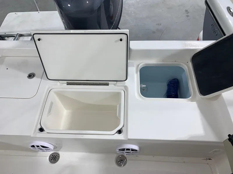 Slide: The Image of 2024 Key West 188 Bay Reef boat storage compartments and livewell. - 10