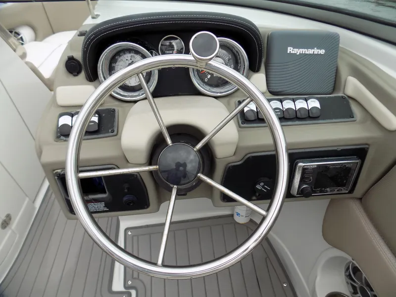 Slide: The Image of Steering wheel and dashboard of 2018 Crownline Eclipse E23 XS boat with Raymarine equipment. - 10