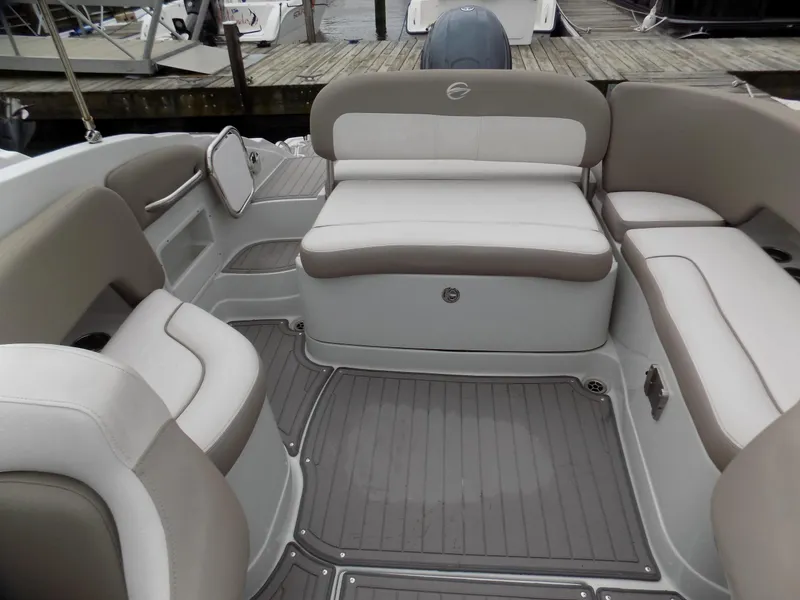 Slide: The Image of 2018 Crownline Eclipse E23 XS boat interior with spacious seating and modern design. - 11
