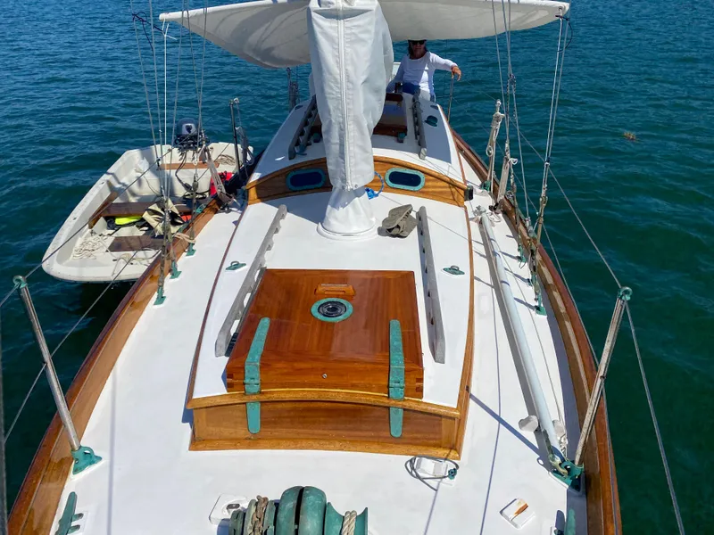 Slide: The Image of Laurent Giles Vertue Class Sloop, 2010, sailing on calm blue waters. - 17