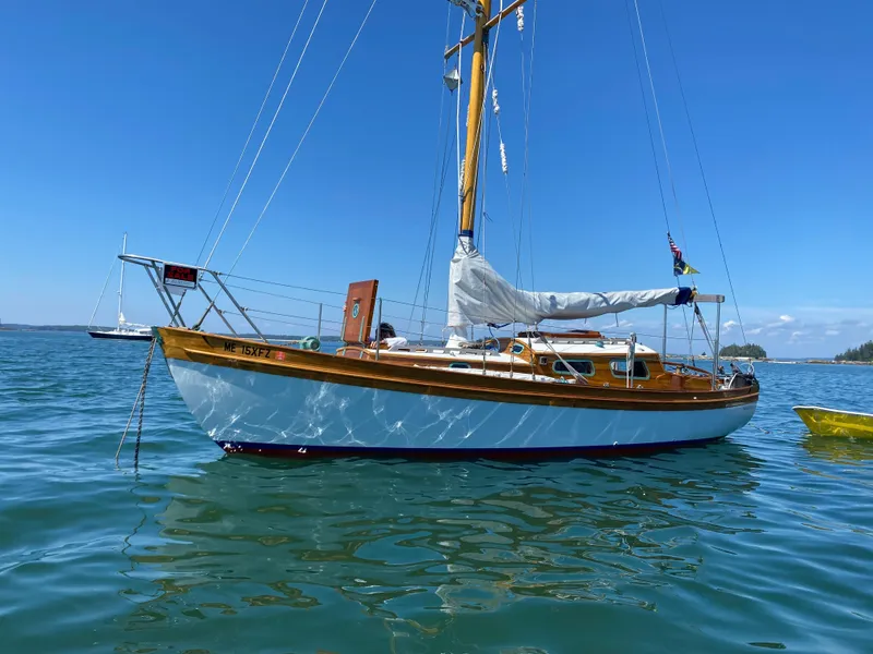 Slide: The Image of Laurent Giles Vertue Class Sloop, 2010, sailing on calm blue waters under clear skies. - 3