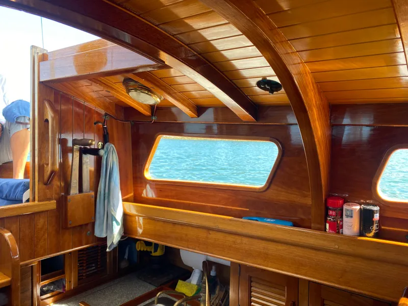 Slide: The Image of Interior of 2010 Laurent Giles Vertue Class Sloop with polished wood and ocean view. - 41