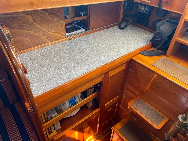 Slide: The Image of Interior of 2010 Laurent Giles Vertue Class Sloop with wooden cabinetry and countertop. - 42