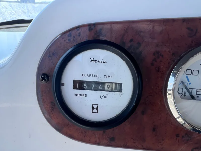Slide: The Image of Hour meter showing 1574.9 hours on 1999 Silverton 392 Motor Yacht. - 13