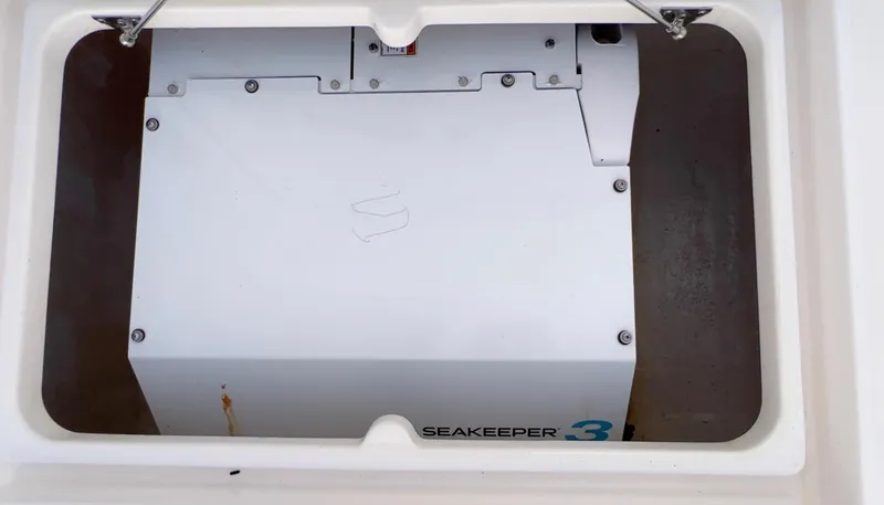 Slide: The Image of Seakeeper 3 gyroscopic stabilizer in 2020 Intrepid 345 Nomad boat compartment. - 10