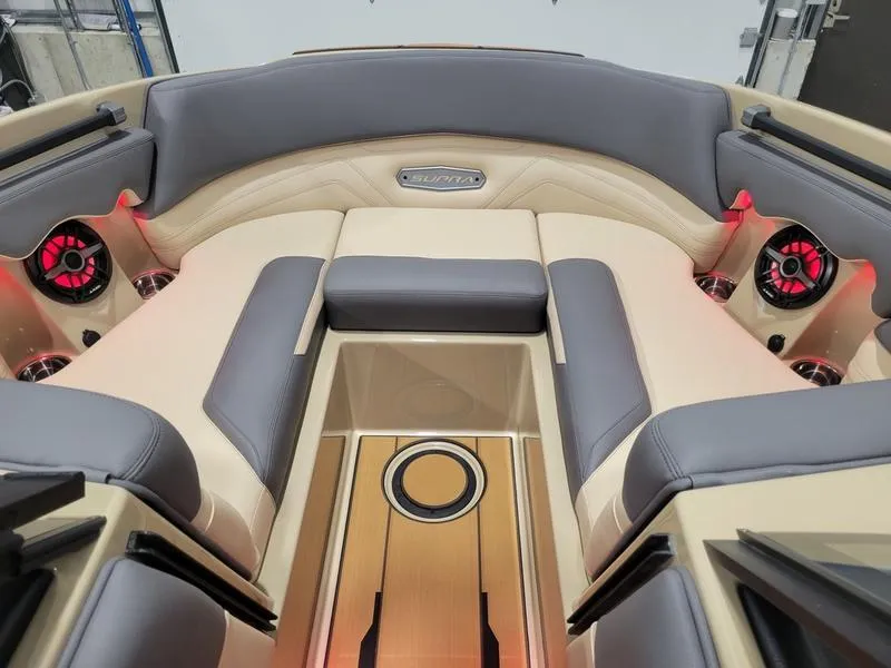 Slide: The Image of 2022 Supra SR400 boat interior with luxurious seating and ambient lighting. - 18