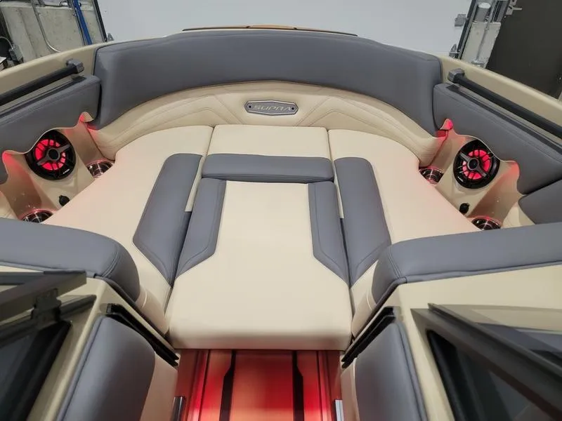 Slide: The Image of Luxurious interior of 2022 Supra SR400 boat with plush seating and ambient lighting. - 24