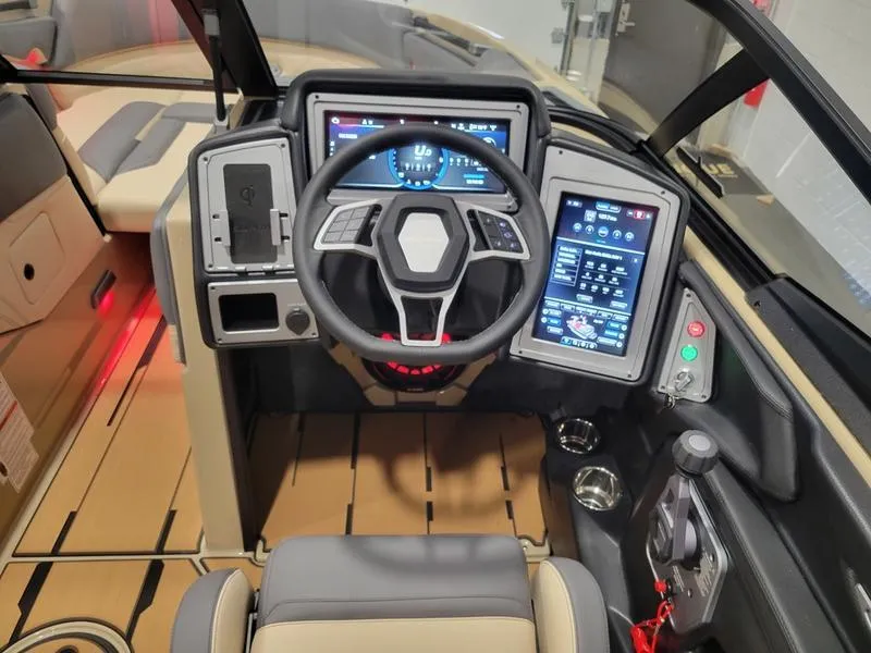 Slide: The Image of 2022 Supra SR400 boat cockpit with advanced digital dashboard and steering wheel. - 28