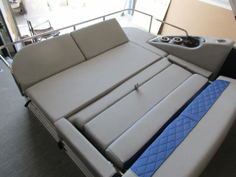 Slide: The Image of 2023 Bennington 25 LTSB boat interior with spacious seating and cup holders. - 6